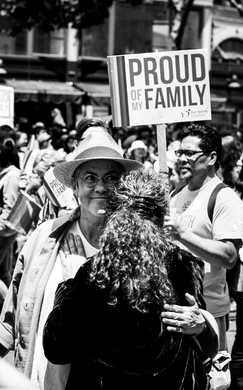 A couple of women hugging during the San Francisco Pride parade