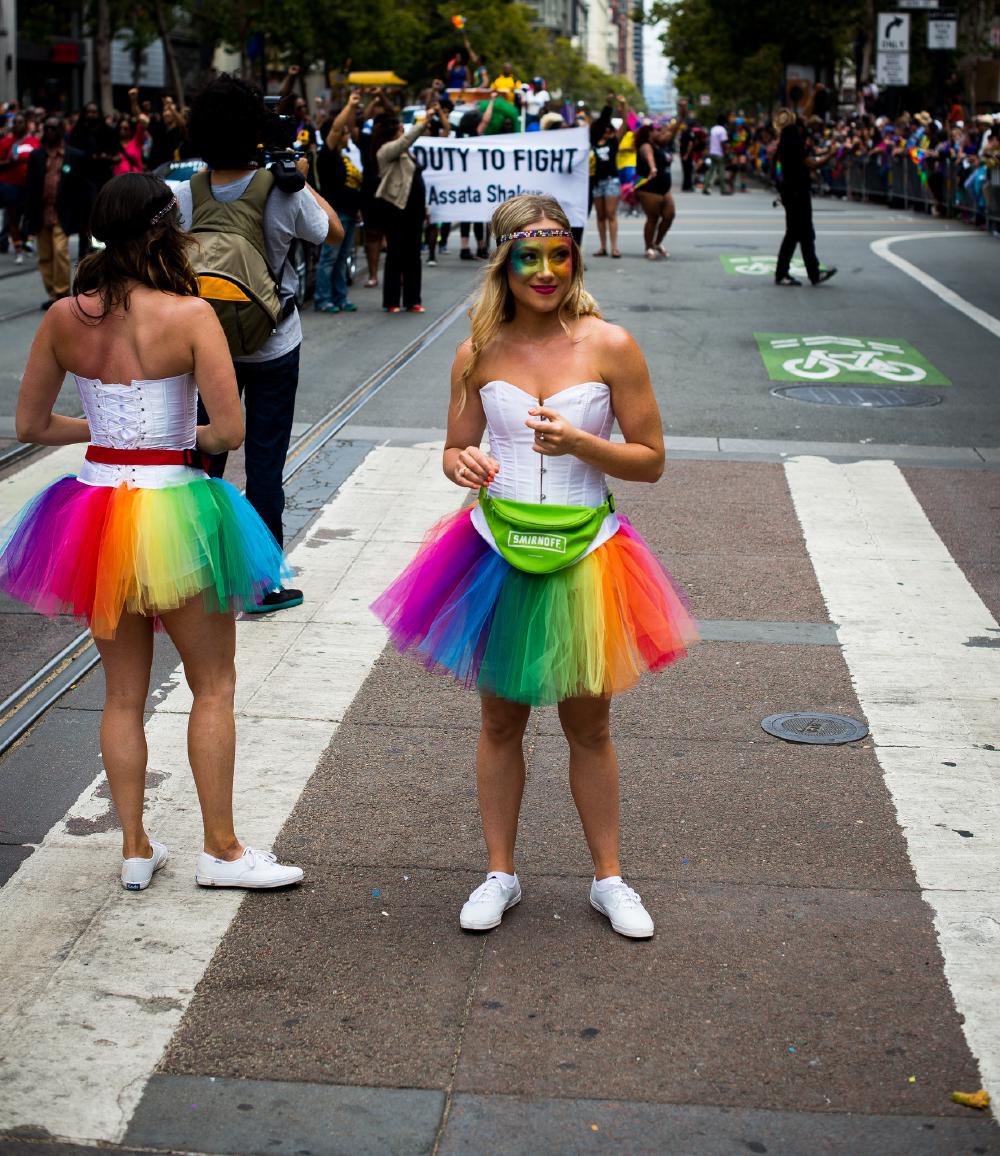 A women in a colorful dress during the San Francisco Pride parade