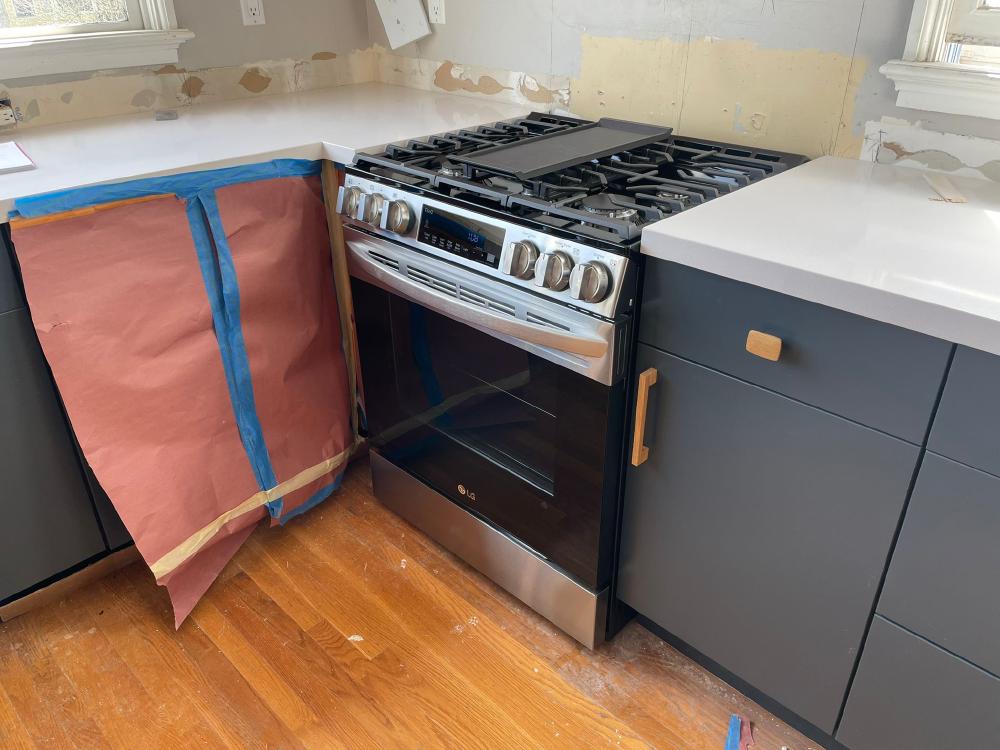 A view of the range and dishwasher in our kitchen
